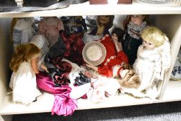 A large selection of vintage dolls in a variety of outfits/costumes, comprising thirteen