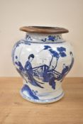 A blue and white Chinese vase of baluster form, decorated with figures within a landscape scene,