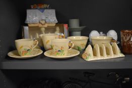 A 1930's Brentleigh ware part breakfast set, two coffee cups and saucers, tea cup and saucer, sugar,