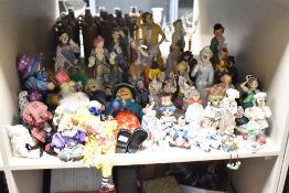 A large assortment of novelty clown toys and figures, comprising fifty four pieces approximately.