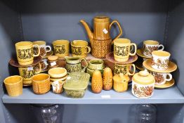 A Royal Worcester Pallisey part tea service decorated with foliage on a cream ground, sold