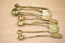 A quantity of measuring spoons having impressed makers mark for Blake & Mackenzie, No '507417', (