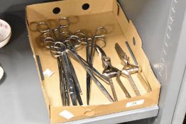 A group of stainless steel medical clamps, (11)