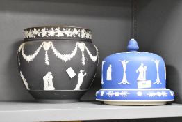 A Wedgewood Jasperware cheese dome and stand, decorated with classical figures and floral