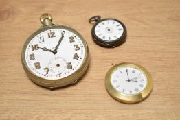 A Swiss Made 8-day pocket watch, w6.5cm, sold together with a Quartz clock face and a miniature