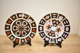 A Royal Crown Derby 'Old Imari 1128' pattern plate, decorated with floral and geometric motifs,