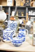 An oriental blue and white lamp with markings to underside sold together with a Royal Doulton teapot