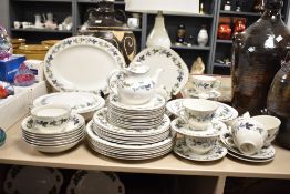 A Royal Doulton bone china 'Burgundy' part dinner/tea service comprising fifty four pieces