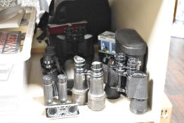 Six pairs of assorted binoculars including a pair of Carl Veich 20x50 and Boots 10x50, three cases