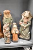 A group of Folk Art style figures, to include Dom Perignom, bagpipe player and Madonna ect (6)