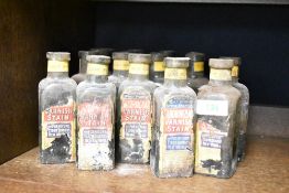 A group of 17 early 20th century glass Sandringham varnish stain bottles, retailed by Martindale