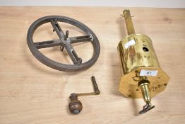 A 20th century brass roasting jack with hanger, (3)