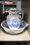 A large vintage blue and white wash jug and bowl.