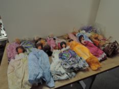 1980's Hong Kong made Dolls and clothing, 14 + dolls and parts