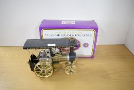 A Mamod Limited Edition Steam 4 Fun Live Steam TE1A Steam Tractor, brass boiler, brass wheels with
