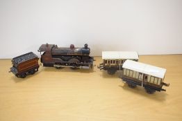 Carette (Bassett Lowke) O Gauge, 0-4-0 Spirit Fired Locomotive 854 having twin pistons both marked