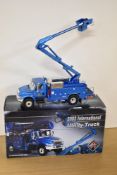 A First Gear 1:34 scale Die-cast, 2002 International Utility Truck, boxed