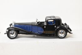 A 1989 Franklin Mint 1:24 scale Die-cast, 1930 Bugatti Royale Coupe Napoleon with tag and Letter, in