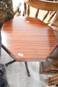 A modern mahogany octagonal occasional table in the Regency style