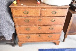 A Georgian golden oak chest of two over three drawers, on bracket feet, width approx. 93cm
