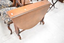 A Victorian mahogany Sutherland style table having turned gate leg, width approx. 92cm