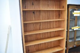 A pine bookshelf , approx height 191 x 122cm