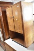 A vintage side cabinet having recess to base, width approx. 55cm