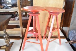 Two adjustable stools