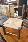 A 19th Century rush seated childs chair