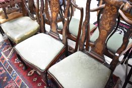 A pair of 19th Century vase back dining stairs in the Dutch style having marquetry foliate vase