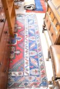 A traditional Persian style rug, approx 210 x 122cm