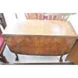 An early 20th Century gateleg dining table and set of four chairs, width approx. 91cm