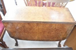 An early 20th Century gateleg dining table and set of four chairs, width approx. 91cm