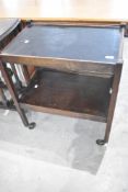 An early to mid 20th Century oak framed tea trolley