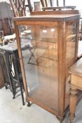 An early 20th Century oak china cabinet, width approx. 58cm , height 104cm