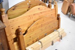 Two modern pine bed frames, king and double