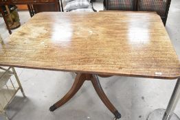 A 19th Century Regency style pedestal dining table, approx. 143 x 104cm