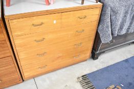 A vintage commercial style chest of two over three drawers having formica top, width approx. 91cm