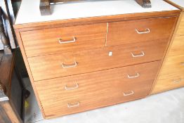 A vintage commercial style chest of two over three drawers having formica top, width approx. 91cm