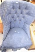 A vintage style button back nursing chair