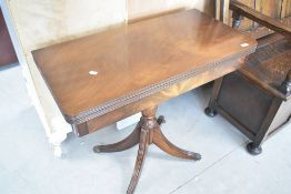 A reproduction Regency fold over card table, width approx. 86cm depth 43cm (closed)