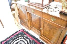 A traditional oak sideboard in the period style, width approx. 153cm