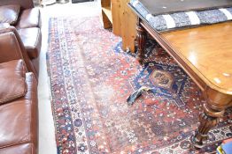 A traditional Persian style room sized carpet, approx 210 x 300cm
