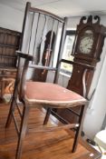 An Edwardian mahogany carver chair