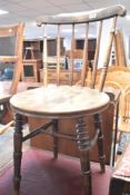 A 19th century kitchen chair having spindle back and turned frame