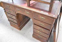 A Victorian stained frame pedestal desk, having brass Aesthetic style handles, width approx. 118cm