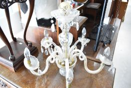 A vintage glass multi branch ceiling light fitting