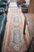 A vintage carpet runner , approx. 327 x 80cm