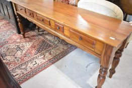 A reproduction mahogany dresser base, width approx 190cm