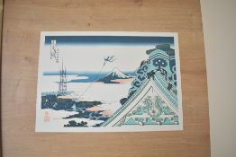 After Katsushika Hokusai (Japanese 1760-1849) two coloured Japanese prints 'Honganji Temple in